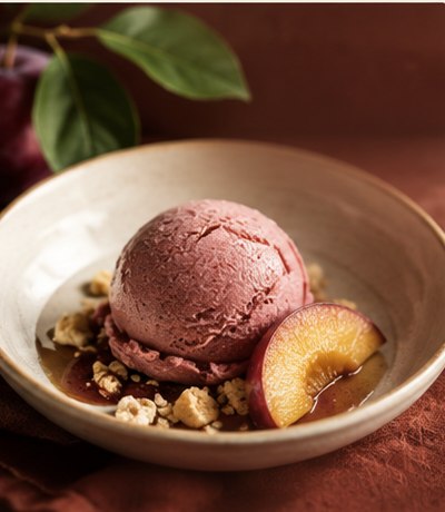A bowl of stone-fruit sorbet with sliced fruit